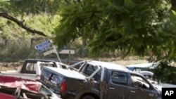This general view shows vehicles damaged by recent flooding in the Australian town of Grantham on January 16, 2011.