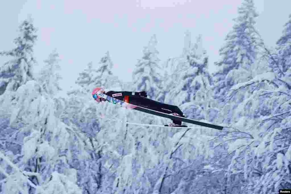 Poland&#39;s Dawid Kubacki soars through the air during his first jump at the Ski Flying World Championships in Planica, Slovenia.