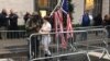 A protester in New York outside the Trump Tower.