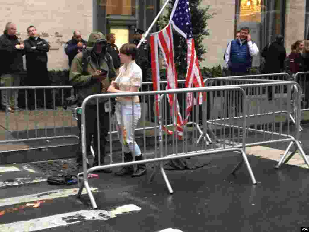 A protester in New York outside the Trump Tower