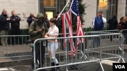 A protester in New York outside the Trump Tower.