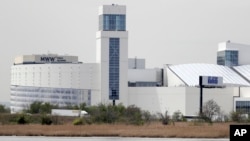 This April 25, 2019 file photo, shows the exterior view of the construction site of the American Dream mall in East Rutherford, N.J. (AP Photo/Julio Cortez, File)