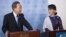 UN Secretary General Ban Ki-Moon and Burma's opposition leader Aung San Suu Kyi speak at a joint media conference at the United Nations in New York, September 21, 2012.