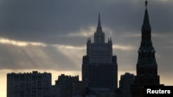 FILE - A view shows a tower of the Kremlin (R) and the Foreign Ministry headquarters (back) in Moscow, Russia, March 16, 2018. 