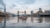 A mock-up of a typical British suburban home is seen sinking into the River Thames, in a protest by Extinction Rebellion to demand faster government action on climate change in London, Britain November 10, 2019. 