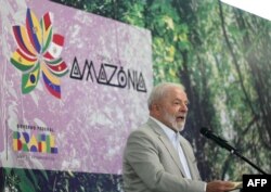 Brazil's President Luiz Inacio Lula da Silva gives a statement to the press during the Amazon Summit at the Hangar Convention Centre in Belem, Para State, Brazil, on August 9, 2023. (Photo by Evaristo SA / AFP)