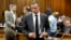 Olympic and Paralympic track star Oscar Pistorius arrives in court ahead of his trial at the North Gauteng High Court in Pretoria, March 3, 2014.