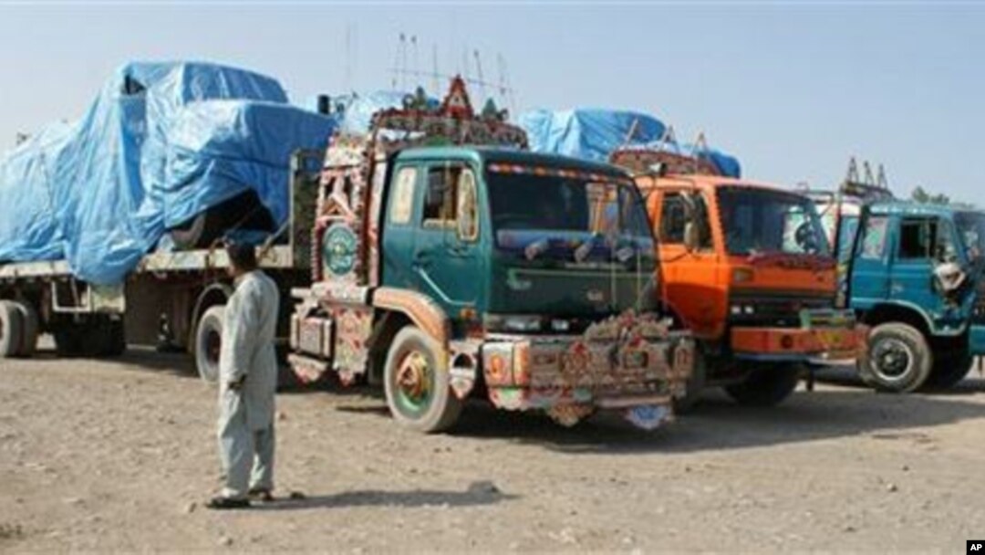 Afghanistan-bound NATO trucks are parked at a roadside as authorities blocked NATO supply line to Afghanistan after NATO allegedly killed three border guards at Pakistani border, at tribal check post of Takhta Beg in Khyber area of Pakistan near Pak-Afgha