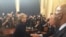 Former U.S. Secretary of State Hillary Clinton greets people following her morning testimony before the House Select Committee on Benghazi on Capitol Hill, Oct. 22, 2015. 