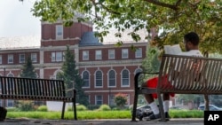 FILE - A young man at Howard University campus July 6, 2021, in Washington, DC. The number of international students has returned to pre-pandemic levels at American colleges and universities. (AP Photo/Jacquelyn Martin, File)