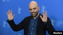 Screenwriter and author Roberto Saviano poses during a photocall to promote the movie "Piranhas" at the 69th Berlin International Film Festival in Berlin, Germany, Feb. 12, 2019. 