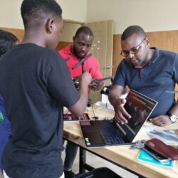 Instructors are seen teaching students at the African Drone and Data Academy in Malawi. (Lameck Masina/VOA)