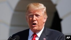 President Donald Trump delivers remarks on the economy from the South Lawn of the White House, July 27, 2018, in Washington. 