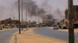 Smoke rises in Omdurman, near Halfaya Bridge, during clashes between the Paramilitary Rapid Support Forces and the army as seen from Khartoum North, Sudan April 15, 2023.