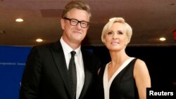 FILE - MSNBC's Joe Scarborough and Mika Brzezinski arrive for the annual White House Correspondents' Association dinner in Washington, April 25, 2015. 