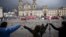  FILE - Demonstrators hold hands to support a peace accord between the Colombian government and rebels of the Revolutionary Armed Forces of Colombia, FARC, at the main square in Bogota, Colombia, Oct. 8, 2016.
