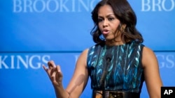 Michelle Obama speaks about "mobilizing for children's rights, supporting local leaders and improving girls' education", Dec. 12, 2014, at the Brookings Institution in Washington. 