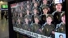 A TV screen shows file images of North Korean soldiers during a news program at Seoul Railway Station in Seoul, South Korea, Oct. 18, 2024. 