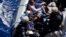 FILE - Rescued migrants sit in a German Navy boat besides Finish Special Forces,  prior to board the German combat supply ship 'Frankfurt am Main' during EUNAVFOR MED Operation Sophia in the Mediterranean Sea off the coast of Libya, March 29, 2016. The MSF has relaunched rescue operations in the Mediterranean Sea, accusing European governments of failing to act to save migrants in peril at sea.