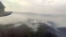 This image taken from video provided by Russian Emergency Ministry, shows a view of a forest fire from a Russian Emergency Ministry multipurpose amphibious aircraft in the Trans-Baikal National Park in Buryatia, southern Siberia, Russia, July 9, 2020.