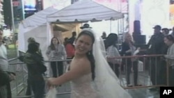 A royal wedding watcher gets into the spirit in New York's Times Square.