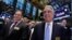 FILE - Kodak Chairman James Continenza, left, and then-CEO Antonio Perez visit the New York Stock Exchange trading floor, before ringing the opening bell, Jan. 8, 2014.