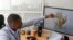 Kenneth Mwangi, a satellite information analyst at the Intergovernmental Authority on Development's Climate Prediction and Applications Center, shows a map predicting the movement of desert locust swarms, in Nairobi, Kenya, March 5, 2020.