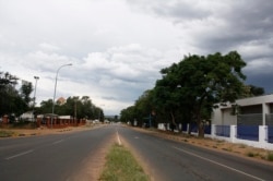 A street is empty during a 28-day lockdown, to help prevent the spread of COVID-19, in Botswana. (Mqondisi Dube/VOA)