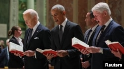 From left, U.S. President Joe Biden, former U.S. President Barack Obama and former U.S. President President Bill Clinton attend a memorial service for Ethel Kennedy at the Cathedral of St. Matthew the Apostle in Washington, October 16, 2024.