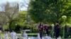 Students wearing masks make their way through the University of Chicago campus, May 6, 2021, in Chicago, Illinois.