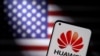 Smartphone with a Huawei logo is seen in front of U.S. flag in this illustration. (Dado Ruvic/Reuters)