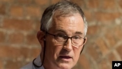 FILE - The Financial Times Asia news editor, Victor Mallet, speaks during a luncheon at the Foreign Correspondents Club in Hong Kong, Aug. 14, 2018.