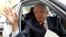Andres Manuel Lopez Obrador, presidential pre-candidate of the National Regeneration Movement (MORENA), waves as he leaves an event during which he unveiled his anti-corruption plan he will put in place if he wins this year's election, in Mexico City, Jan
