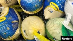 Frozen turkeys displayed at a supermarket ahead of the Thanksgiving holiday in Chicago, Illinois, Nov. 22, 2022. 