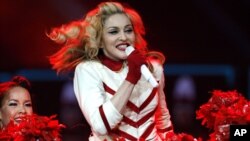 Madonna performs at the Joe Louis Arena in Detroit. 