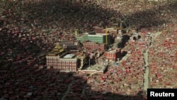 FILE - A view shows the settlements of Larung Gar Buddhist Academy in Serthar County of Ganze Tibetan Autonomous Region, Sichuan province, China, July 23, 2015. 