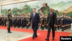 FILE - Chinese President Xi Jinping and Maldivian President Mohamed Muizzu attend a welcome ceremony at the Great Hall of the People in Beijing, Jan. 10, 2024. (cnsphoto via Reuters)