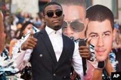 OMI arrives at the Much Music Video Awards, June 21, 2015, in Toronto, Canada.