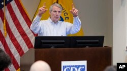 FILE - U.S. Sen. Rob Portman, R-Ohio, discusses efforts to increase health and safety for workers at a National Institute for Occupation Safety and Health (NIOSH) facility in Cincinnati, April 1, 2016. 