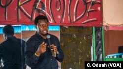 Lexxus Legal tells a group of rappers that it's time for them to get involved in politics, either locally or nationally, during a gathering in Kinshasa, Democratic Republic of Congo.