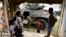 Children look at an armored vehicle in Toribio, southwest Colombia, Oct. 30, 2019. 