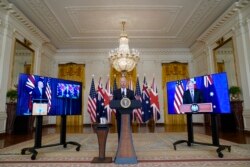 지난 9월 조 바이든 미국 대통령(가운데)이 백악관에서 스콧 모리슨 호주 총리(왼쪽), 보리스 존슨 영국 총리 등 '오커스(AUKUS)' 안보동맹 정상들과 화상회담을 했다.