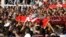 Relatives and colleagues carry the coffin of a Tunisian policeman Socrate Cherni during a funeral as they proceed to Kef Cemetery in Kef, 168 km (104 miles) from Tunis, Oct.24, 2013. 