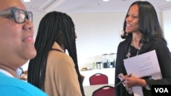 South Carolina lawmaker Mia McLeod, right, chats with students during an Elect Her workshop. At left is Jasmine Gil, chief of staff for the College of Charleston’s Student Government Association.