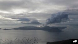 A cloud of steam comes out of Taal Volcano as seen from Tagaytay, Cavite province, southern Philippines, Jan. 17, 2020.