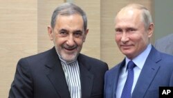 Али Акбар Велаяти и Владимир Путинв. Москва, Россия, 12 июля 2018