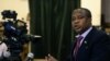 Zimbabwe's Finance Minister Mthuli Ncube delivers a speech to present his mid-term budget statement on Aug. 1, 2019 in Harare. 