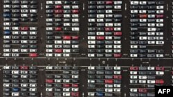 An aerial view shows lines of new Honda cars parked up at the Royal Portbury Dock in Avonmouth, near Bristol in south-west England. The absence of a Brexit deal would alter the once almost seamless trade between the UK and the EU.