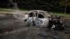 Vue d'une voiture détruite, dans laquelle des cadavres ont été retrouvés, à la suite d'un bombardement russe à Kharkiv, Ukraine, le 21 avril 2022. (REUTERS/Alkis Konstantinidis)