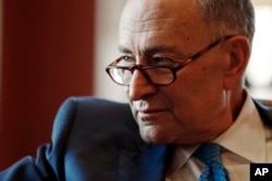 FILE - Senate Minority Leader Chuck Schumer of New York has urged congressional Republicans to rethink their support for Trump. "We need Republicans to set aside partisan considerations in favor of doing what's best for the country," he said.